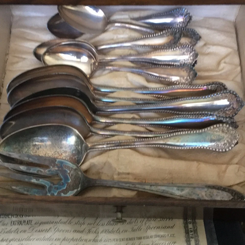 Vintage silverware set in original wooden chest with certificate of authenticity